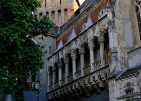 Top 10 Hidden Gems in Budapest Only Locals Know Captivating view of Gothic-style architecture in Budapest with ornate columns and detailed facades.